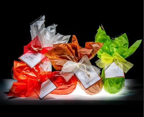 Accompagna l'uovo di cioccolato a un tenero peluche Trudi